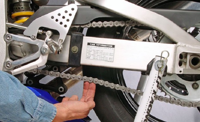 How to adjust motorcycle chain
